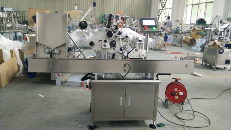 Cina kecepatan tinggi kaleng bulat kecil mesin perekat label, mesin stiker label botol mata hitam untuk pemasok kosmetik