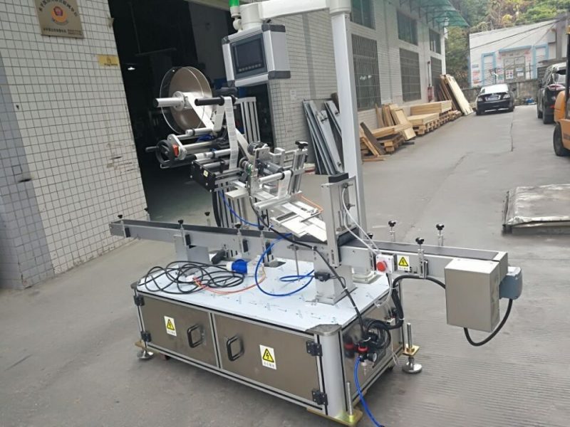 China Sticker Top Labeling Machine Untuk pemasok Nozzle Pouch Electric Driven Type